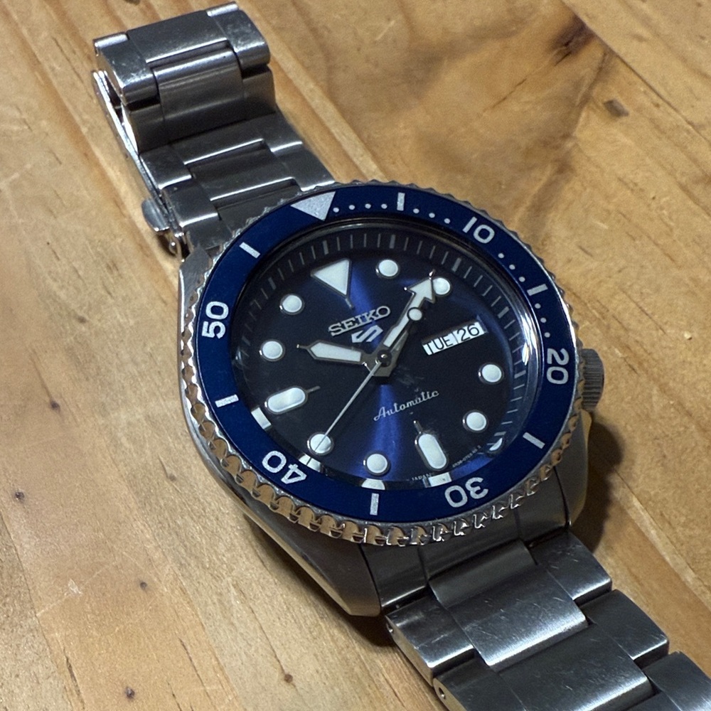 Seiko Blue Bezel Silver Watch